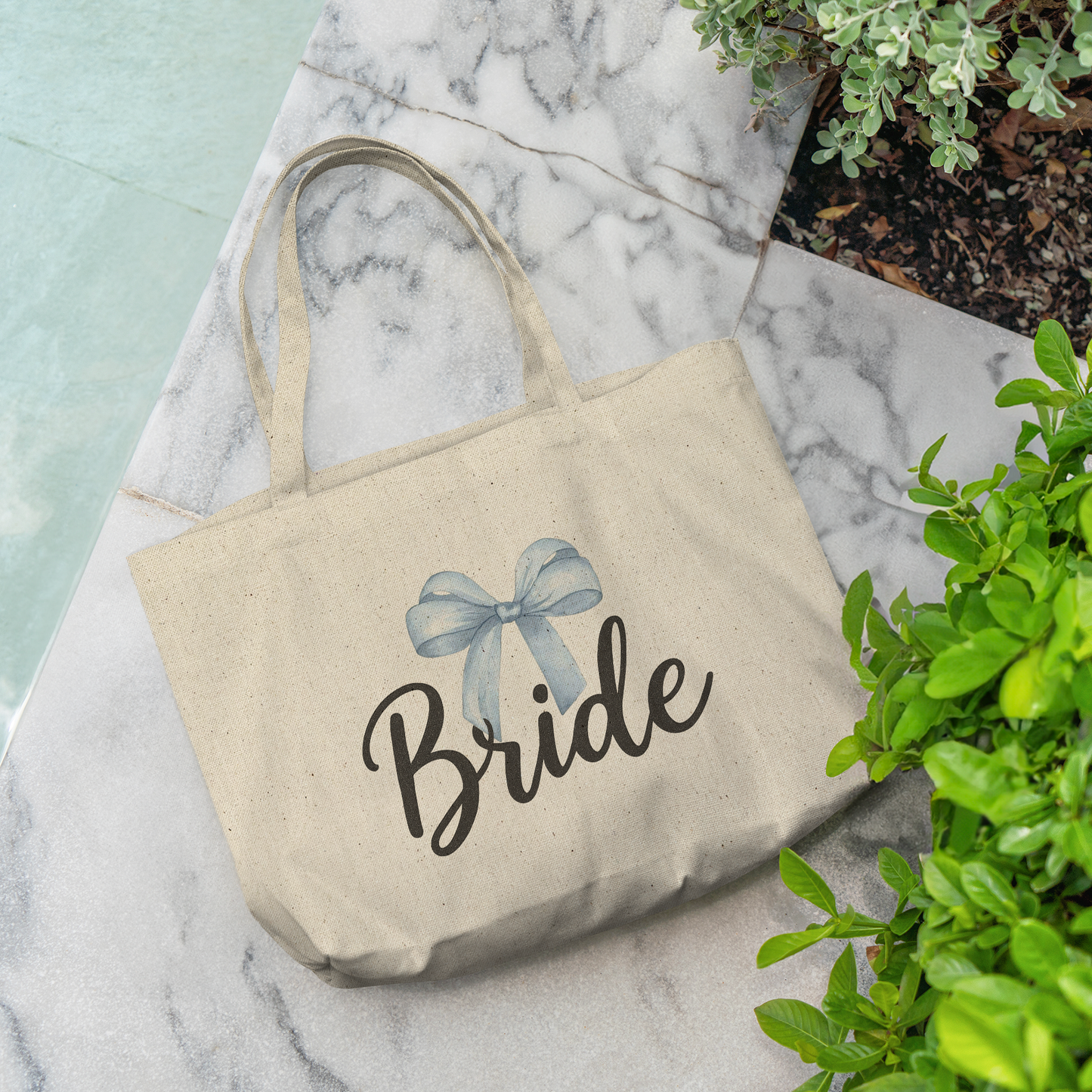 Bride_Tote_Bag__Something_Blue_CottonTote_L_Pool_Mockup.png_14763973