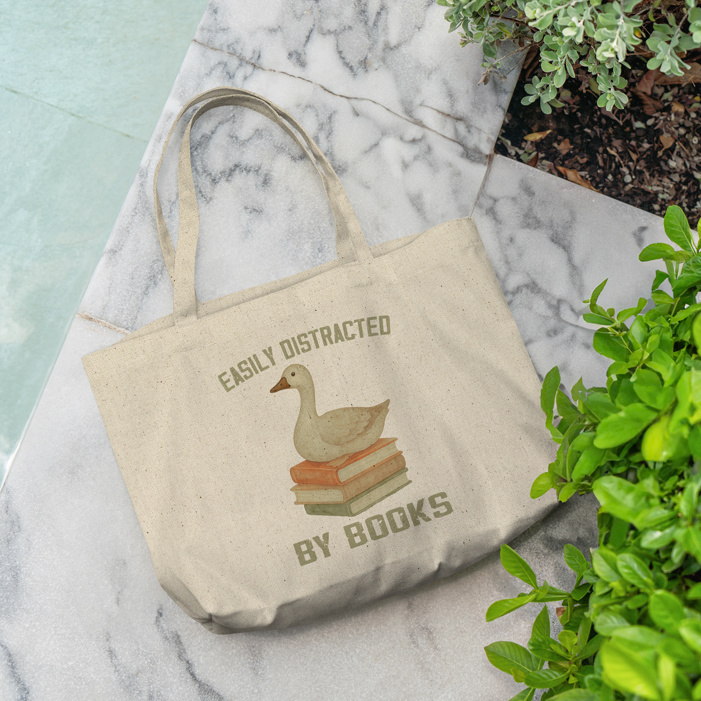 Easily_Distract_By_Books_Canvas_Tote_Bag_CottonTote_L_Pool_Mockup.png_14722468