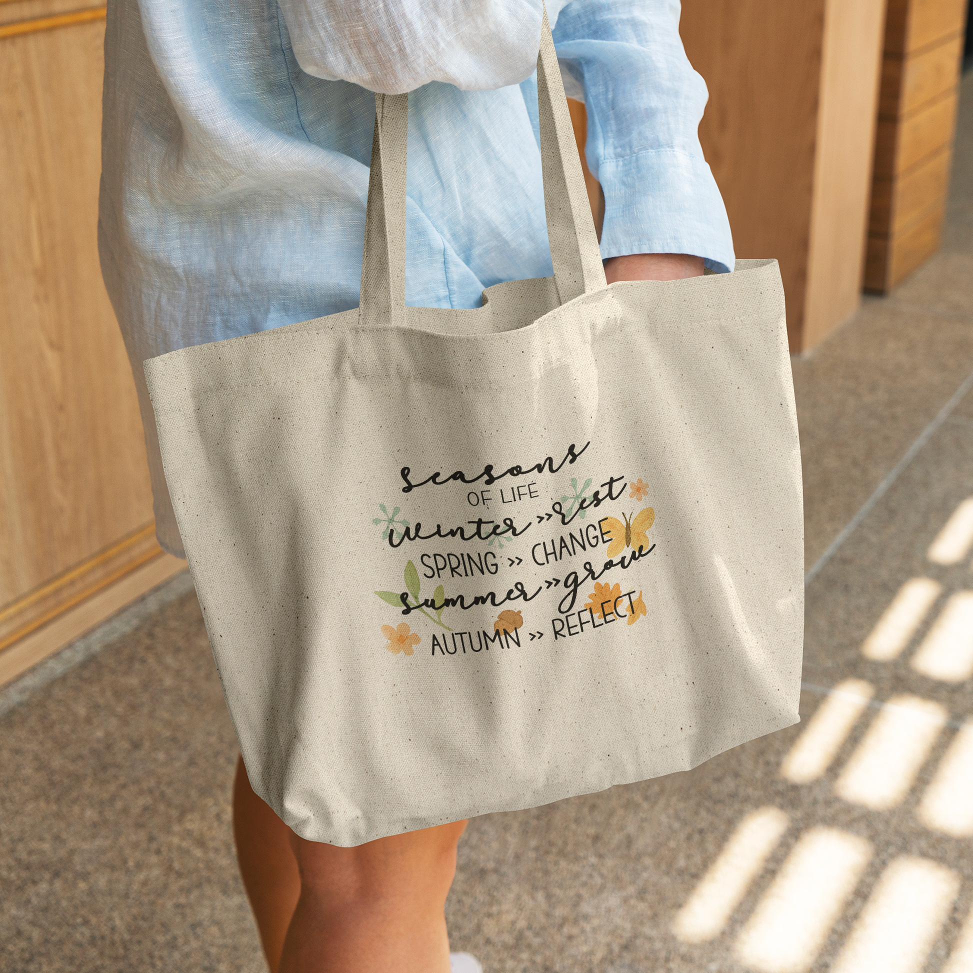 Seasons_of_Life_Tote_Bag_CottonTote_L_WomanDigging_Mockup.png_14642952